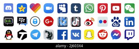 KHARKOV, UKRAINE - FEBRUARY 24, 2021: Many icons of popular social networks and messengers for chat printed on white paper. Logos of modern communicat Stock Photo