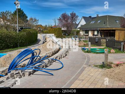 fiber laying for high speed internet construction site Stock Photo