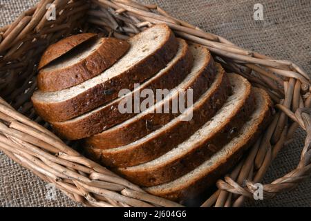 closeup of the bread in wicker rural basket Stock Photo