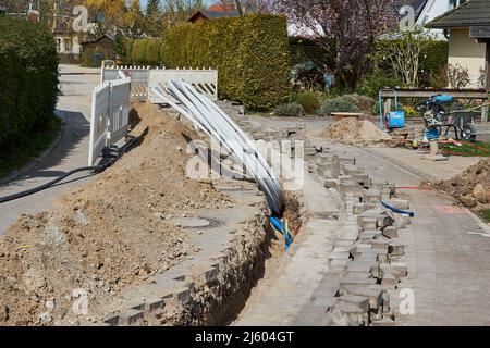 fiber laying for high speed internet construction site Stock Photo