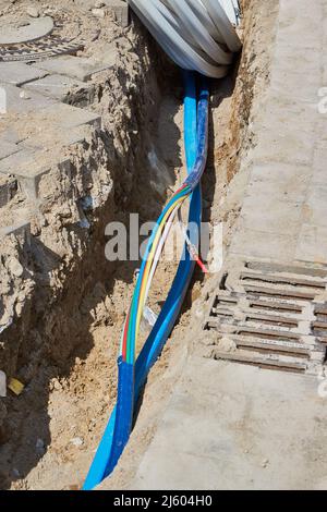 fiber laying for high speed internet construction site Stock Photo