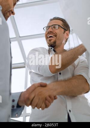 close up.two business people shaking hands Stock Photo