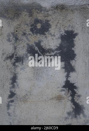 Textured old concrete wall with dark blue natural abstract design Stock Photo