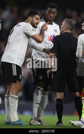 London, England, 26th April 2022. Aleksandar Mitrović of Fulham complains to referee Keith Stroud after the Sky Bet Championship match at Craven Cottage, London. Picture credit should read: Paul Terry / Sportimage Credit: Sportimage/Alamy Live News Stock Photo