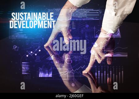 Businessman touching huge screen concept Stock Photo