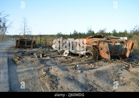 Dmytrivka, Kyiv region, Ukraine - Apr 14, 2022: Destroyed infantry fighting vehicle of the Russian army following the Ukrainian forces counter-attacks Stock Photo