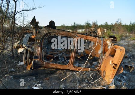 Dmytrivka, Kyiv region, Ukraine - Apr 14, 2022: Destroyed infantry fighting vehicle of the Russian army following the Ukrainian forces counter-attacks Stock Photo