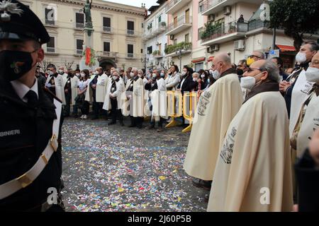 Pagani, Salerno, Italy - April 24, 2022 :Members of the Archconfraternity of Our Lady of the Hens seen during the Celebration of the Holy Mass in Piazza Bernardo D'Arezzo in honor of Santa Maria Incoronata del Carmine called 'Madonna delle Galline' The feast of Our Lady of the Hens is a religious and civil event that takes place annually in Pagani (Salerno) from the Friday of the eighth of Easter to the following Monday. The festival, celebrated in the homonymous sanctuary, is organized by the Carmelite Fathers of the sanctuary itself and by the Archconfraternity of Our Lady of the Hens.Outdoo Stock Photo
