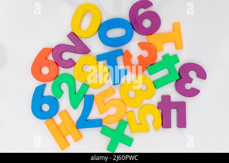 Colorful plastic numbers on a white isolated background Stock Photo