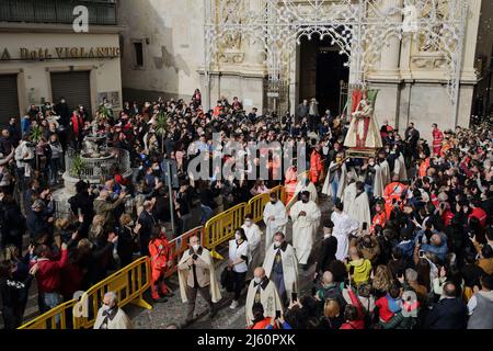 April 26, 2022, Pagani, Salerno, Italy: Pagani, Salerno, Italy - April 24, 2022 : Celebration of the Holy Mass in Piazza Bernardo D'Arezzo in honor of Santa Maria Incoronata del Carmine called ''Madonna delle Galline'' The feast of Our Lady of the Hens is a religious and civil event that takes place annually in Pagani (Salerno) from the Friday of the eighth of Easter to the following Monday. The festival, celebrated in the homonymous sanctuary, is organized by the Carmelite Fathers of the sanctuary itself and by the Archconfraternity of Our Lady of the Hens.Outdoor celebration for the respect  Stock Photo