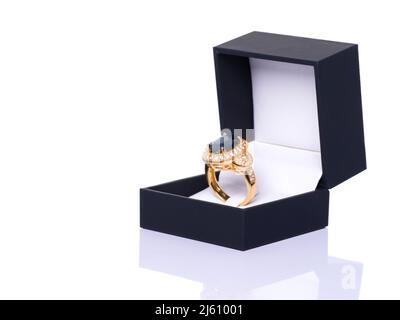 Blue Sapphire and Diamond Jewel or gems ring in dark blue jewel box. Collection of natural gemstones accessories. Studio shot Stock Photo