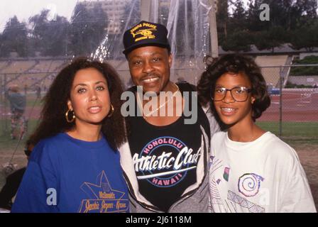 Denise Nicholas with Roger E. Mosley and his daughter Ch'a at the Jackie Joyner Kersee Invitational June 18, 1989. Credit: Ralph Dominguez/MediaPunch Stock Photo