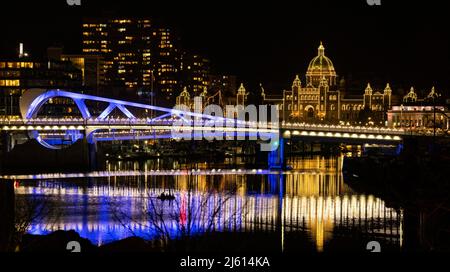 Johnson Street Bridge and British Columbia Parliament Buildings at night - Victoria, Vancouver Island, British Columbia, Canada Stock Photo