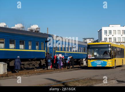 KYIV, UKRAINE 10 March. Children boarding an evacuation train from Kyiv to Lviv, as Russia's invasion of Ukraine continues on 10 March 2022 in Kiev, Ukraine. Russia began a military invasion of Ukraine after Russia's parliament approved treaties with two breakaway regions in eastern Ukraine. It is the largest military conflict in Europe since World War II. Stock Photo