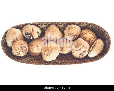 topview of home baked buns and bread decorated with sesame and pumpkin seeds  in bread basket - isolated Stock Photo