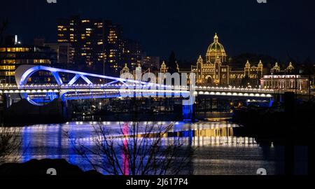 Johnson Street Bridge and British Columbia Parliament Buildings at night - Victoria, Vancouver Island, British Columbia, Canada Stock Photo