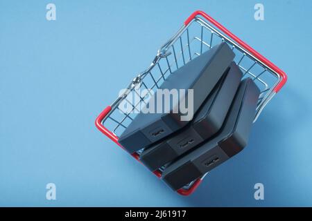 A stack of hard drives in a basket. Stock Photo
