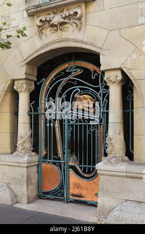 Main entrance to the Castel Béranger in Paris, France. The residential building known as the Castel Béranger was designed by French architect Hector Guimard and built between 1895 and 1898 in Rue Main entrance to the Castel Béranger in Paris, France. The residential building known as the Castel Béranger was designed by French architect Hector Guimard and built between 1895 and 1898 in Rue