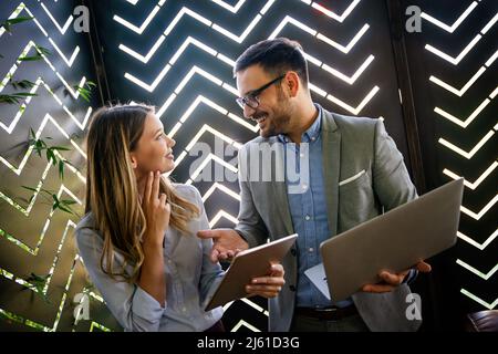 Programmers working in a software developing company office Stock Photo