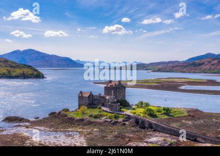 Eilean Donan castle seen from above on sunny day Stock Photo