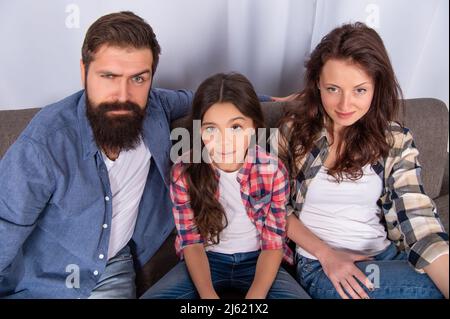 mom dad and daughter love relax together. adoption and charity. family day. friendship. Stock Photo