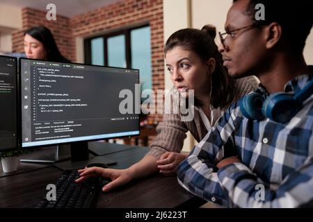 High tech engineer encrypting platform informations through peer to peer file sharing ability. Database server admin updating cloud files processing rate using advanced compression algorithm. Stock Photo