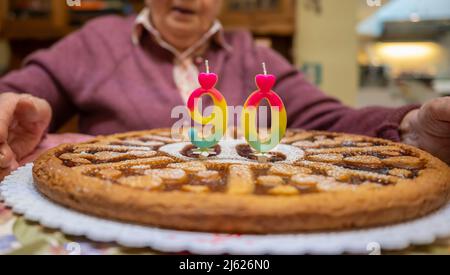 Senior woman at 90's birthday party Stock Photo