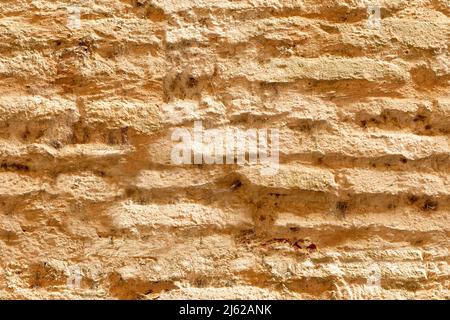 Old wall made adobe brick . Mediterranean medieval style. Seamless pattern texture Stock Photo