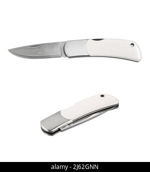 Folding knife with white ivory handle. Luxury pocket knife. Isolate on a white background. Stock Photo