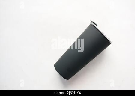 reusable eco coffee cup on table with copy space. Stock Photo