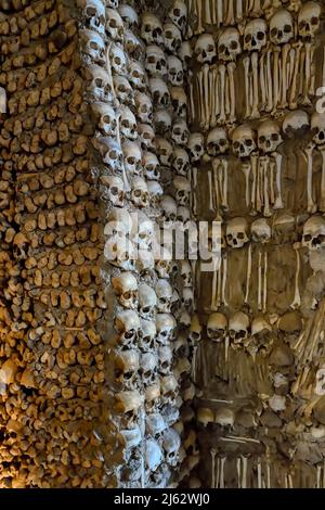 Chapel of Bones, Close-up view of the embedded bones on the wall, Evora, Alentejo, Portugal Stock Photo