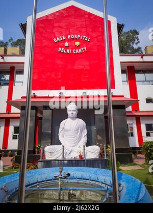 military hospital building with isolated white buddha statue at day from flat angle image is taken at base hospital delhi cant delhi india on Apr 14 2 Stock Photo