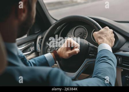 Business man is traveling by modern car Stock Photo