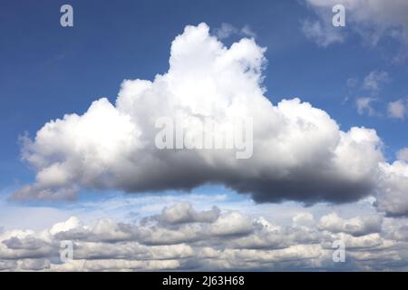 White cumulus clouds in blue sky. Summer cloudscape, beautiful weather background Stock Photo