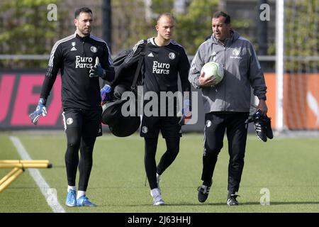 ROTTERDAM - (lr) Feyenoord goalkeeper Ofir Marciano , Feyenoord goalkeeper Tein Troost , Feyenoord goalkeeper trainer Khalid Benlahsen during the training session prior to the match between Feyenoord and Olympique Marseille in the semifinals of the conference league at Trainingscomplex 1908 on April 27, 2022 in Rotterdam, The Netherlands. ANP GERRIT VAN COLOGNE Stock Photo