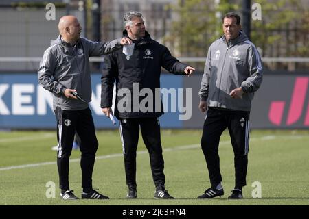 ROTTERDAM - (lr) Feyenoord trainer coach Arne Slot , Feyenoord assistant coach Marino Pusic , Feyenoord goalkeeper trainer Khalid Benlahsen during the training session prior to the match between Feyenoord and Olympique Marseille in the semifinal of the conference league at Trainingscomplex 1908 on April 27, 2022 in Rotterdam, Netherlands. ANP GERRIT VAN COLOGNE Stock Photo