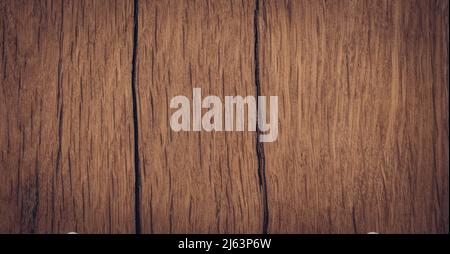 Dark brown cracked oak wood texture background Stock Photo