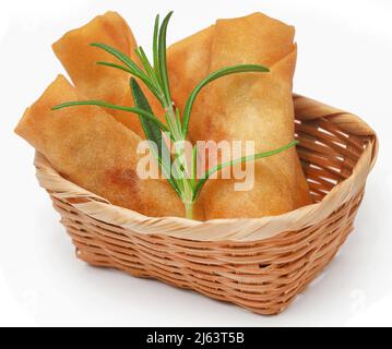 Vegetables rolls with rosemary over white background Stock Photo