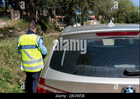 Police Officer Issues A Citation To A Driver In Anticipation Of The Increased Traffic On The French Riviera During The Vacation Season Control Operations Are Regularly Carried Out On The Roads Of