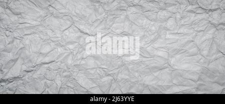 Gray crumpled paper texture background Stock Photo