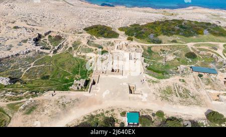 Paphos, Cyprus - April 2, 2022: Aerial view on archaeological Site of the Tombs of the Kings.