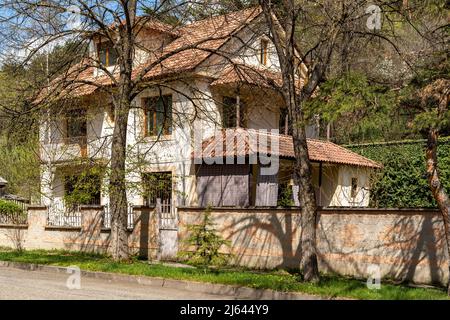 Dilijan, Armenia - April 25, 2022 - White brick house on Getapnya road in Dilijan, Armenia Stock Photo