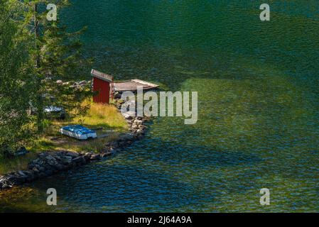 Kristiansand, Norway - August 01 2021: Old ramp for a small ferry in a fjord Stock Photo