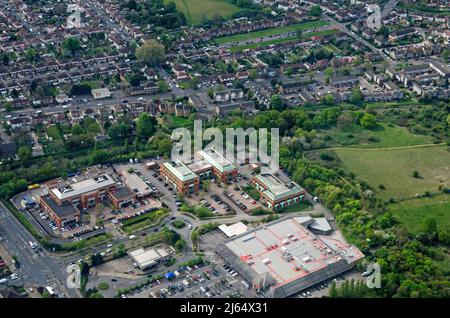 View from above of the West London Family Court, the Asylum and Tribunal Centre and a large branch of Tesco supermarket in Feltham, London.  To the le Stock Photo