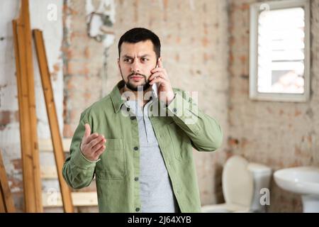 Civil engineer is talking on the phone Stock Photo