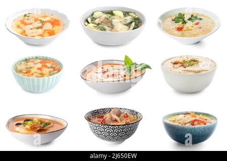 Set of tasty soups in bowls on white background Stock Photo