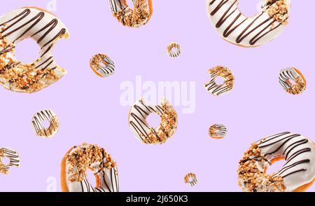 Many flying donuts on light color background Stock Photo