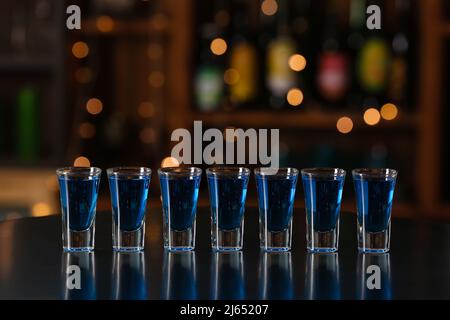 Shot cocktails on table in bar Stock Photo