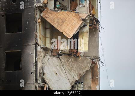 War of Russia against Ukraine. A residential building damaged by an enemy aircraft in the Ukrainian. Consequences of the war, damaged grocery market b Stock Photo