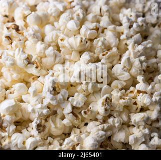 salted popcorn, delicious, low-fat, healthy snack background texture, closeup in shallow depth of field, macro Stock Photo